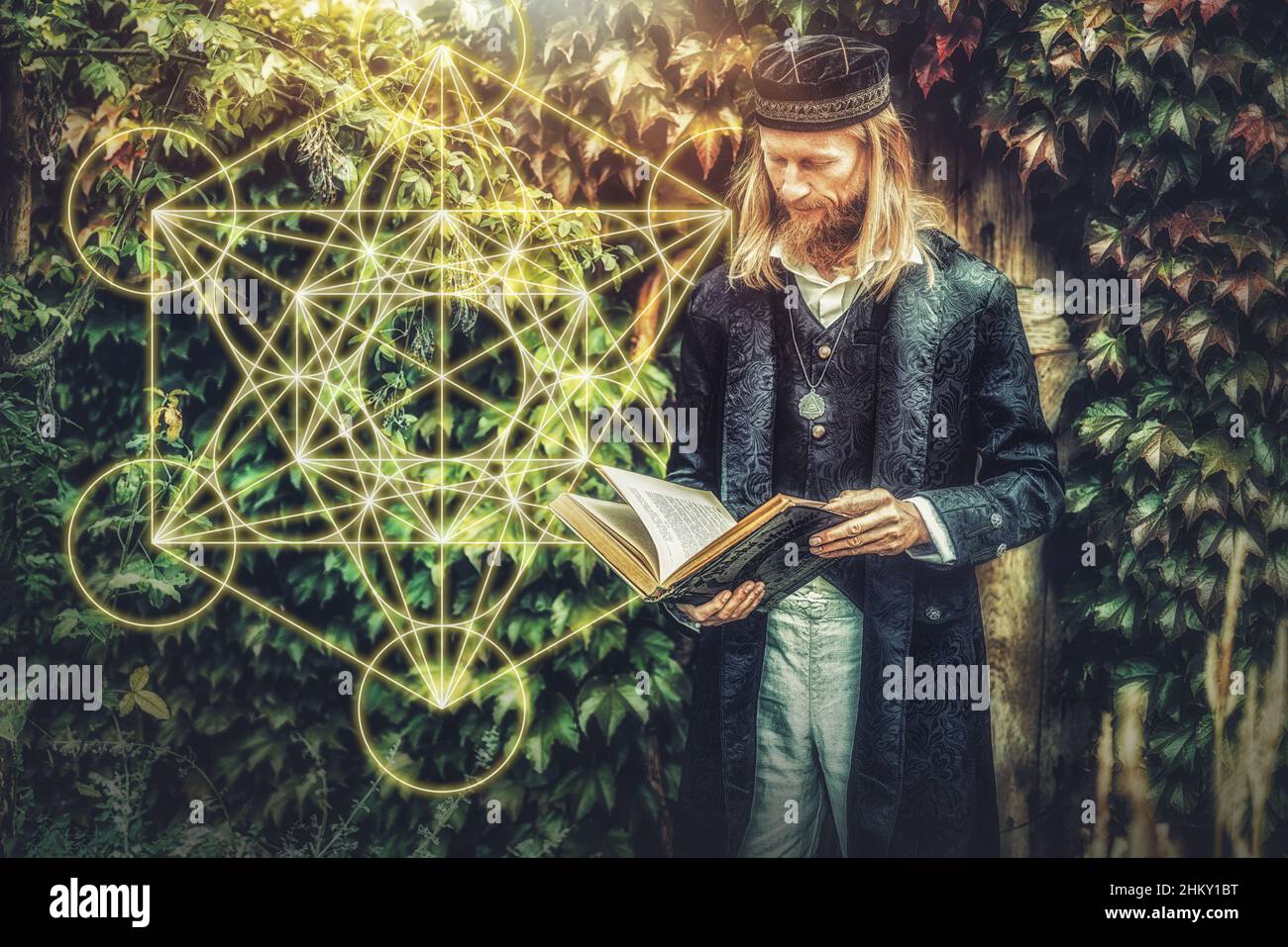 Alchemist in a beautiful ornamental dress in nature. Stock Photo