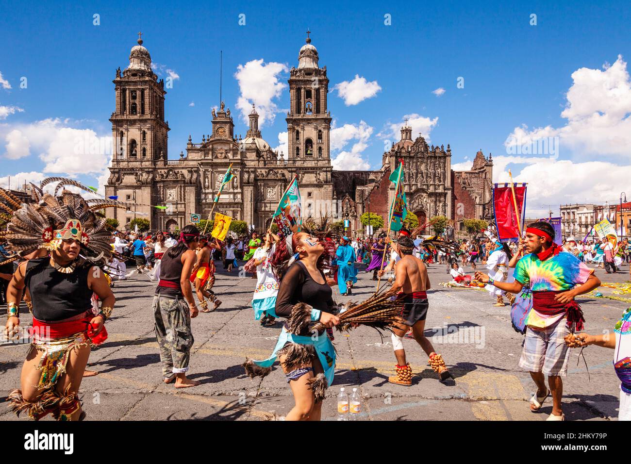 Native mexicans perform a traditional dance in costume, Metropolitan Cathedral (Catedral Metropolitana de la Asuncion de Maria), Plaza de la Constituc Stock Photo