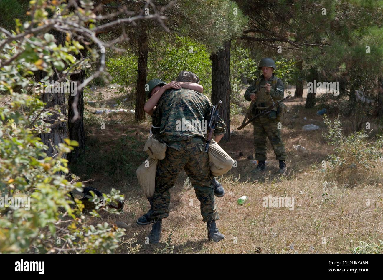 Russian soldiers play in the wood near the city of Gori before entering ...