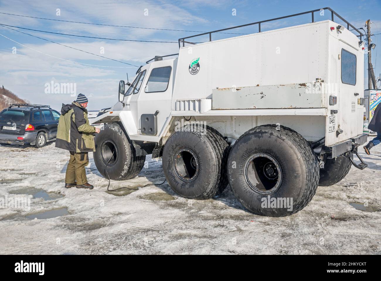 A trekol (russian all terrain six wheels vehicle) in the snow, tundra of Yamalo-Nenets Autonomous Orkug, Russia Stock Photo