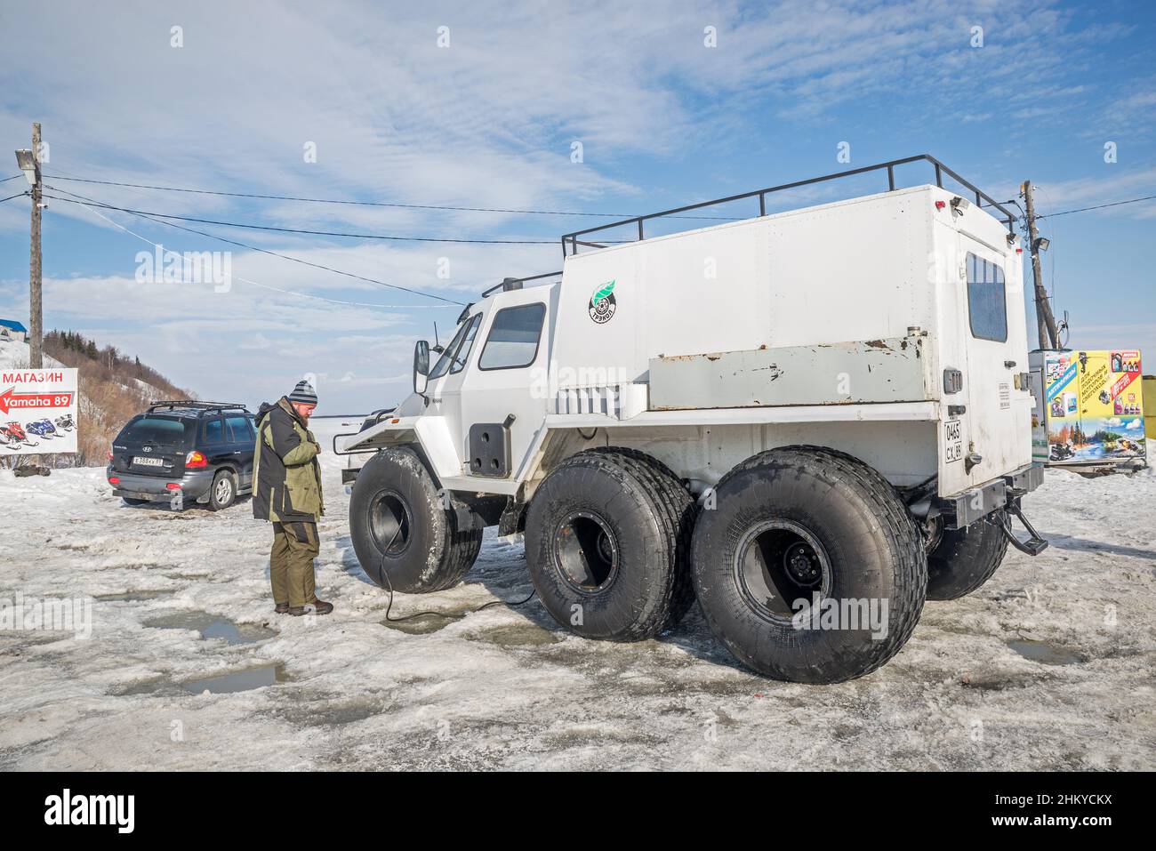 A trekol (russian all terrain six wheels vehicle) in the snow, tundra of Yamalo-Nenets Autonomous Orkug, Russia Stock Photo