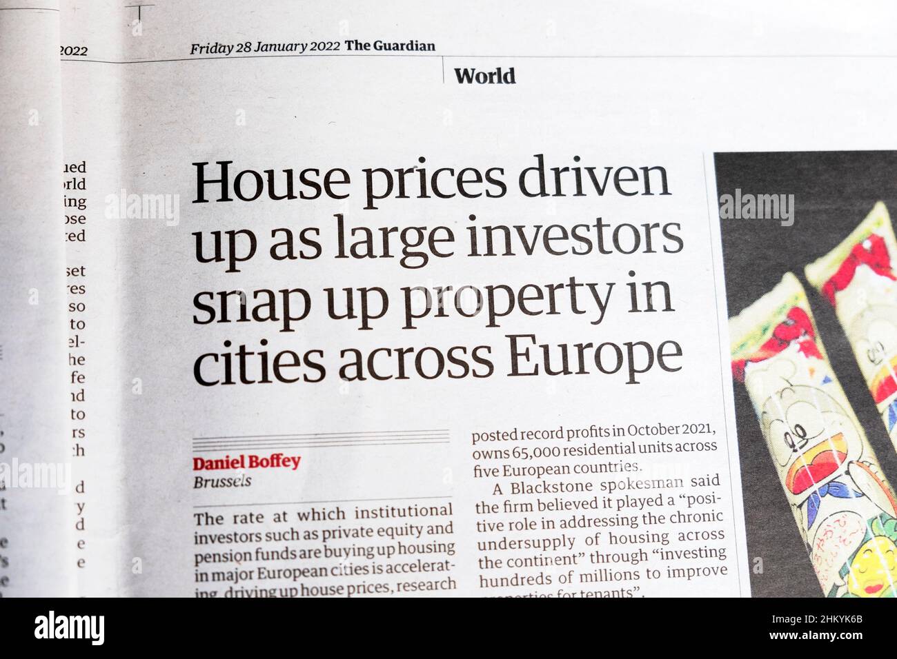 'House prices driven up as large investors snap up property in cities across Europe' Guardian newspaper headline clipping on 28 January 2022 London UK Stock Photo