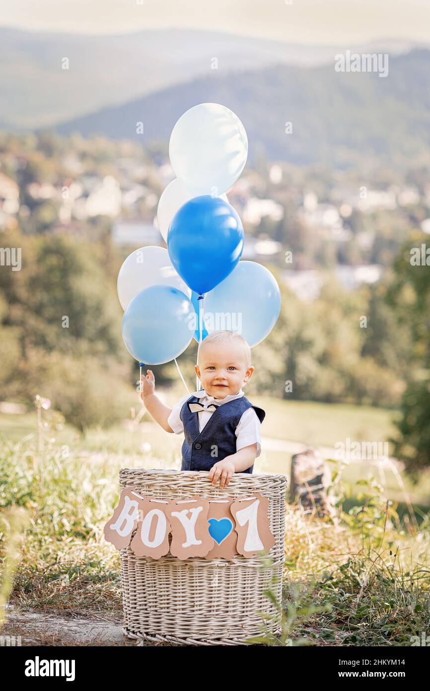 Boy's first birthday with balloon Stock Photo - Alamy