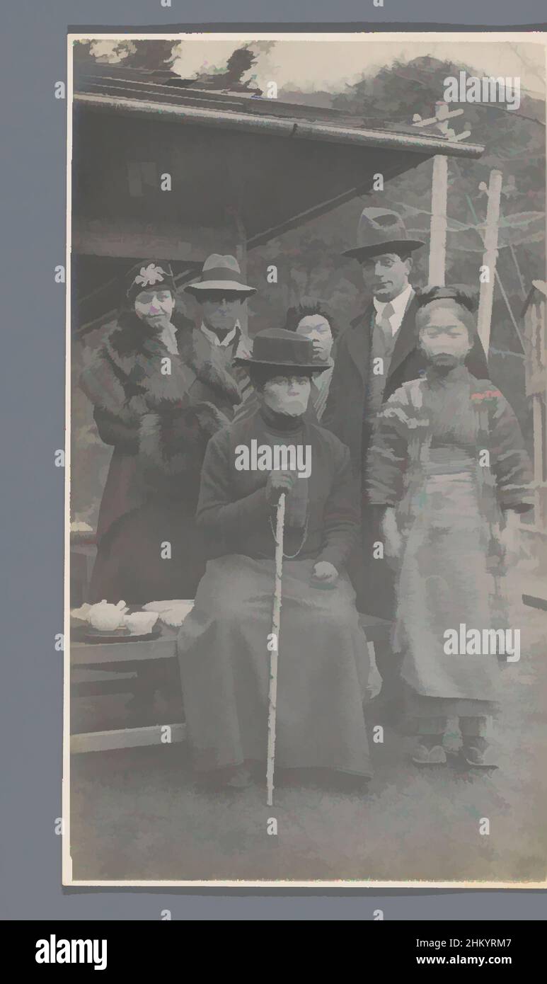 Art inspired by Portrait of two men, two women (of the traveling party), a Japanese girl and a Japanese woman in a simple tea house (?), Nikko, Japan, Jan Adriani (circle of), Japan, 1907, paper, gelatin silver print, height 137 mm × width 78 mm, Classic works modernized by Artotop with a splash of modernity. Shapes, color and value, eye-catching visual impact on art. Emotions through freedom of artworks in a contemporary way. A timeless message pursuing a wildly creative new direction. Artists turning to the digital medium and creating the Artotop NFT Stock Photo