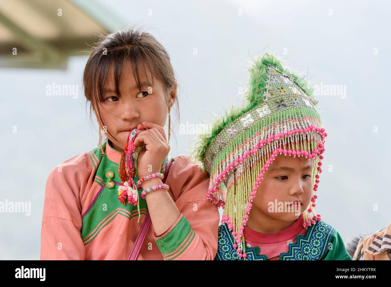 Two young girls wearing traditional Hmong tribe clothing in Cat Cat village, Sapa (Sa Pa), Lao Cai Province, Vietnam, Southeast Asia Stock Photo