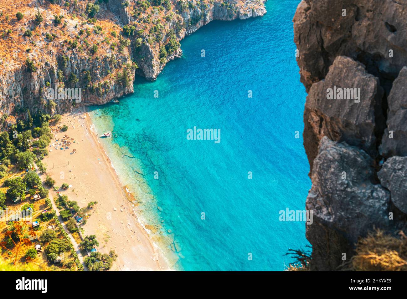 Spectacular view of clear beach and turquoise water of Butterfly Valley in Turkey. Butterfly