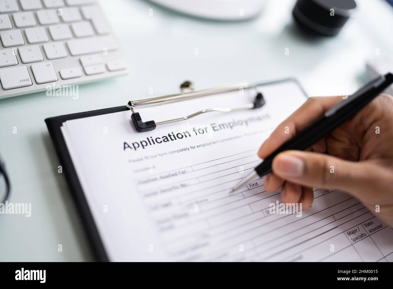 Job Application Form. Employment Document And Interview Stock Photo