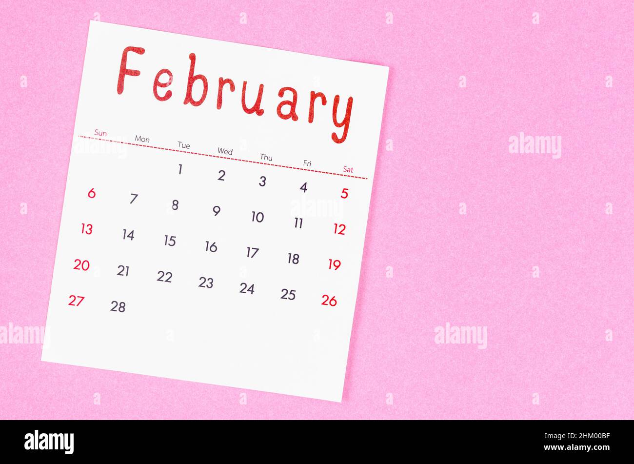 The May 2022 calendar on pink background with empty space. Stock Photo