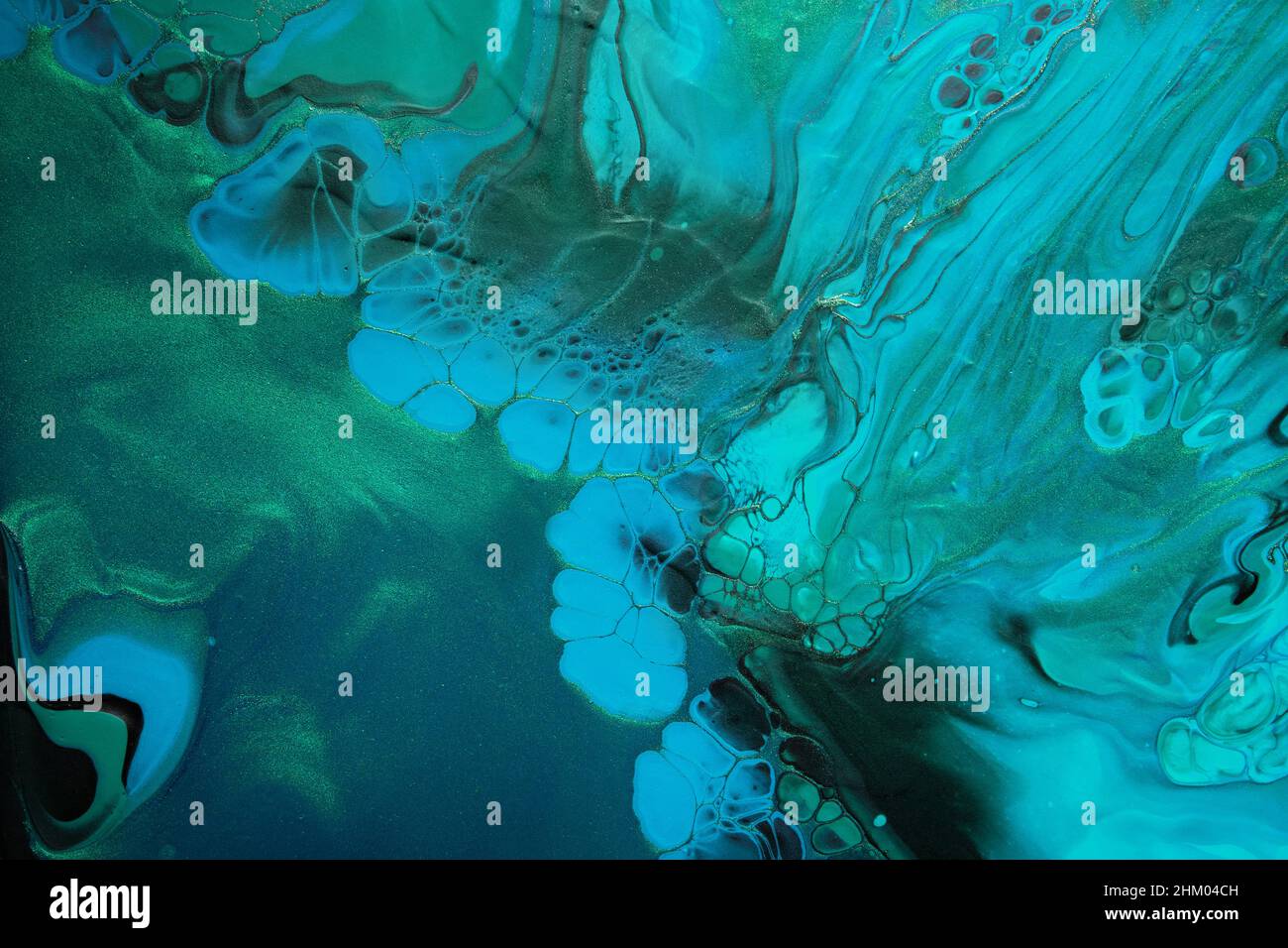 Fluid Art. Green and blue abstract wave swirls on black background ...