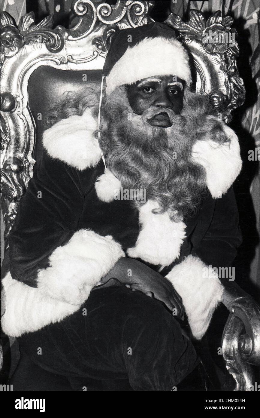 A 1977 portrait of a Black Santa Claus in a downtown Brooklyn Department store. Stock Photo