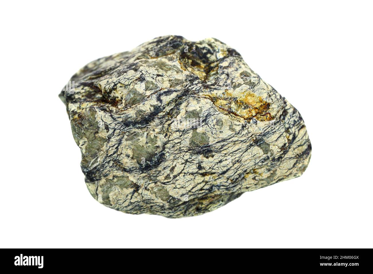 Natural rough serpentinite stone from Southeast Asia, a metamorphic rock composed of serpentine group minerals (Antigorite, Lizardite, and Chrysotile) Stock Photo