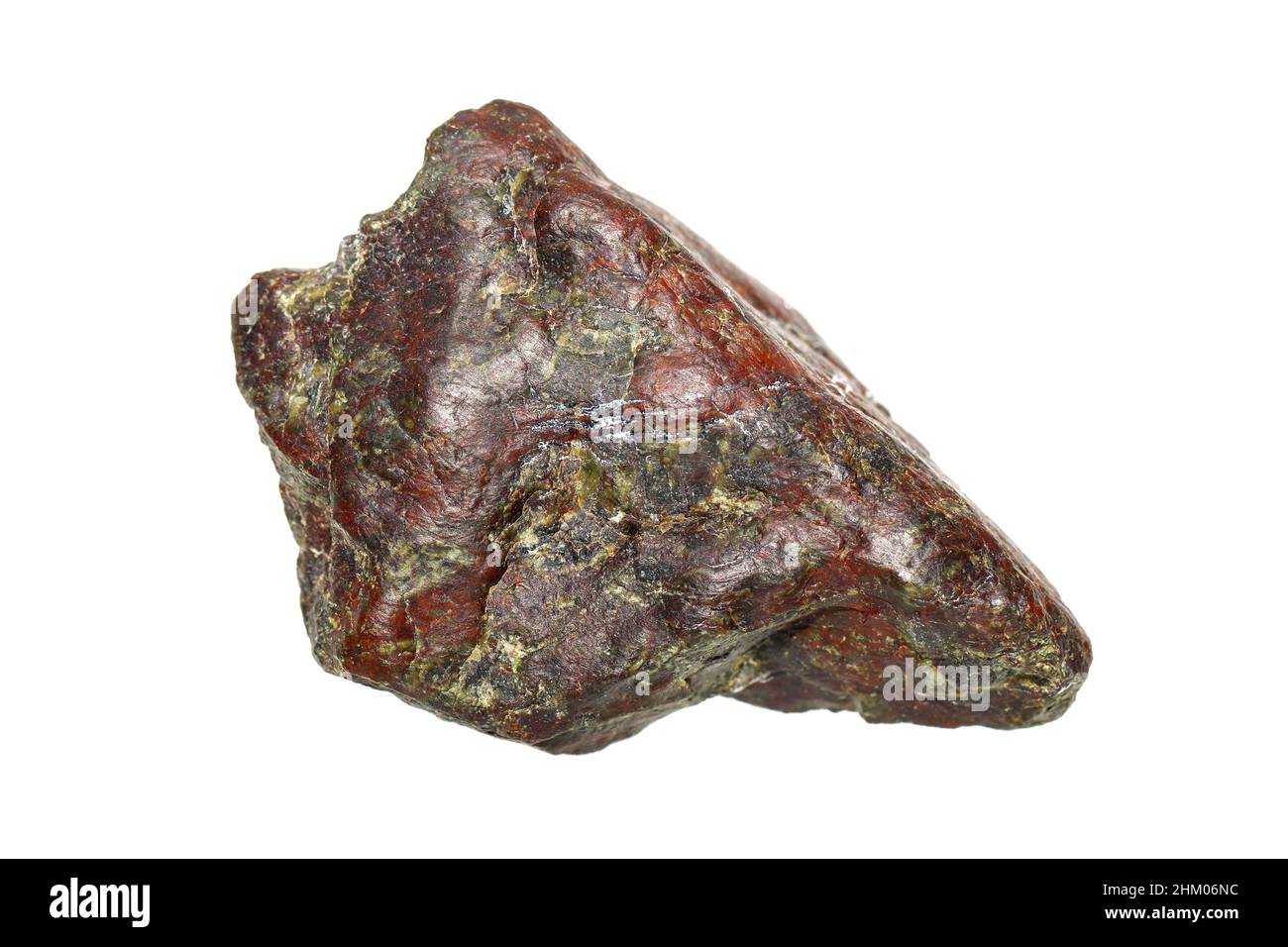 Rough red serpentinite stone from Southeast Asia, a rarity metamorphic rock composed of serpentine group minerals (Antigorite, Lizardite, Chrysotile) Stock Photo