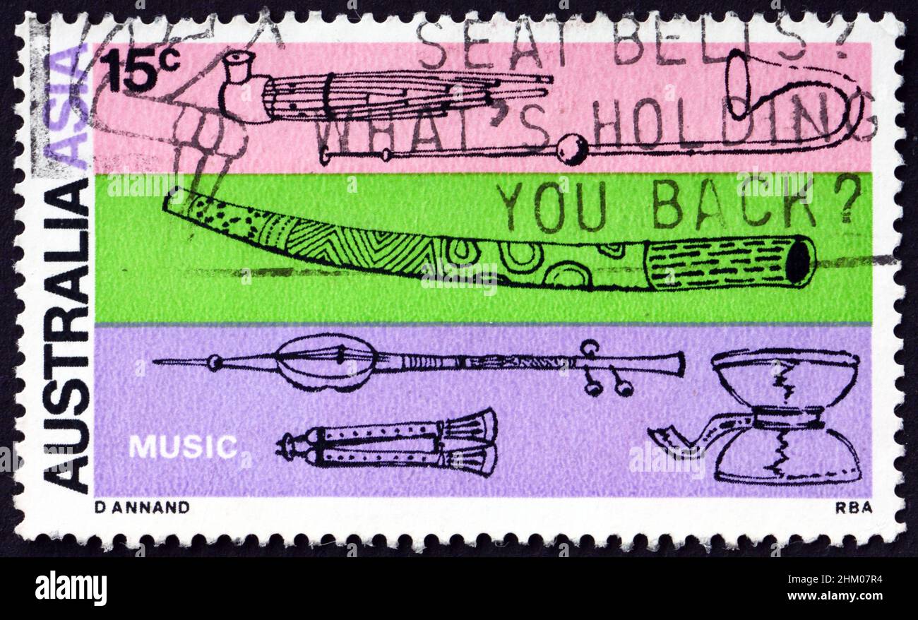 AUSTRALIA - CIRCA 1971: a stamp printed in Australia shows musical instruments, link between Australia and Asia, 28th International Congress of Orient Stock Photo