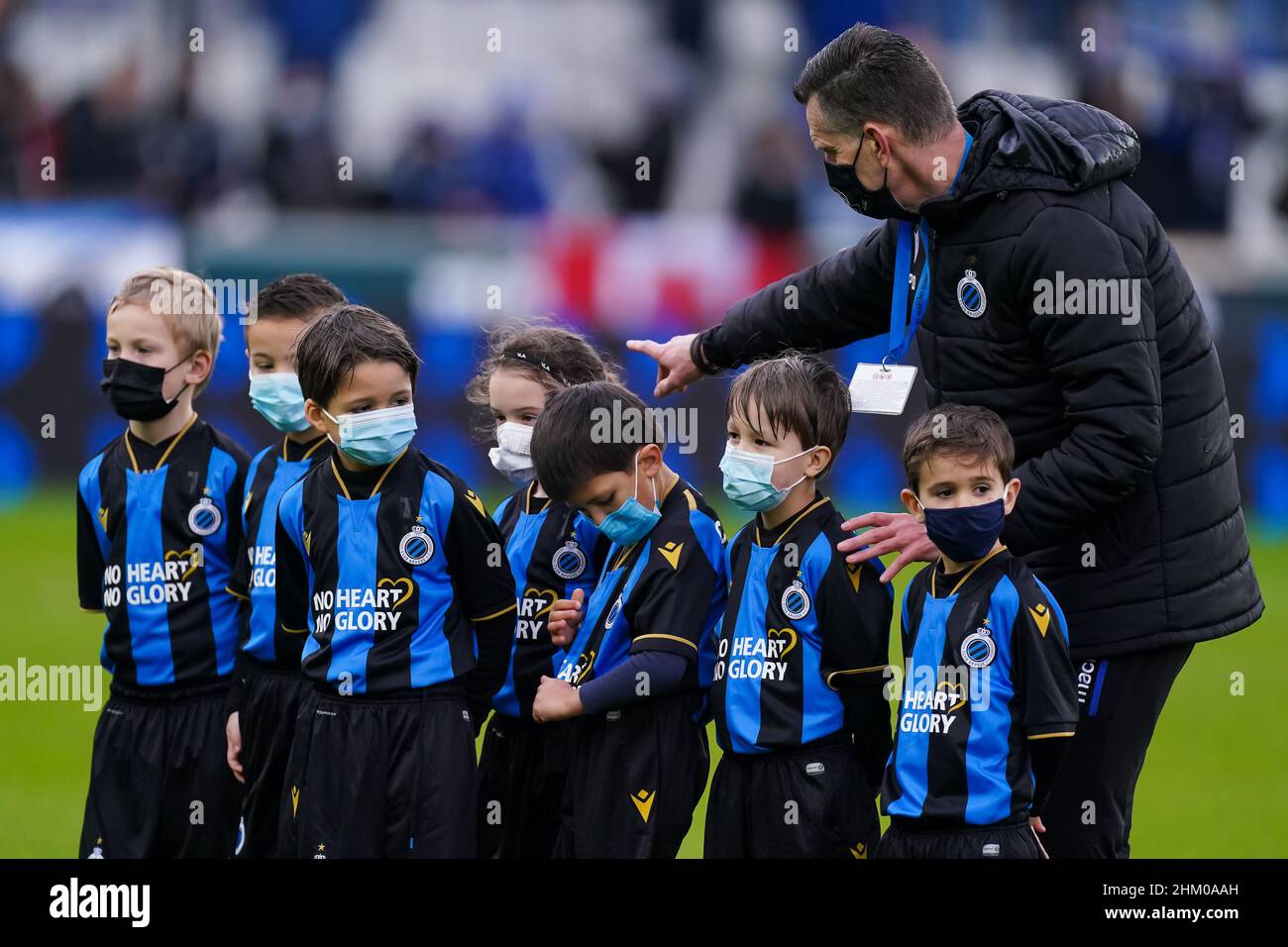 BRUGES, BELGIUM - FEBRUARY 6: Mascots of Club Brugge line up during the  Jupiler Pro League match between Club Brugge and KAA Gent at the Jan  Breydelstadion on February 6, 2022 in