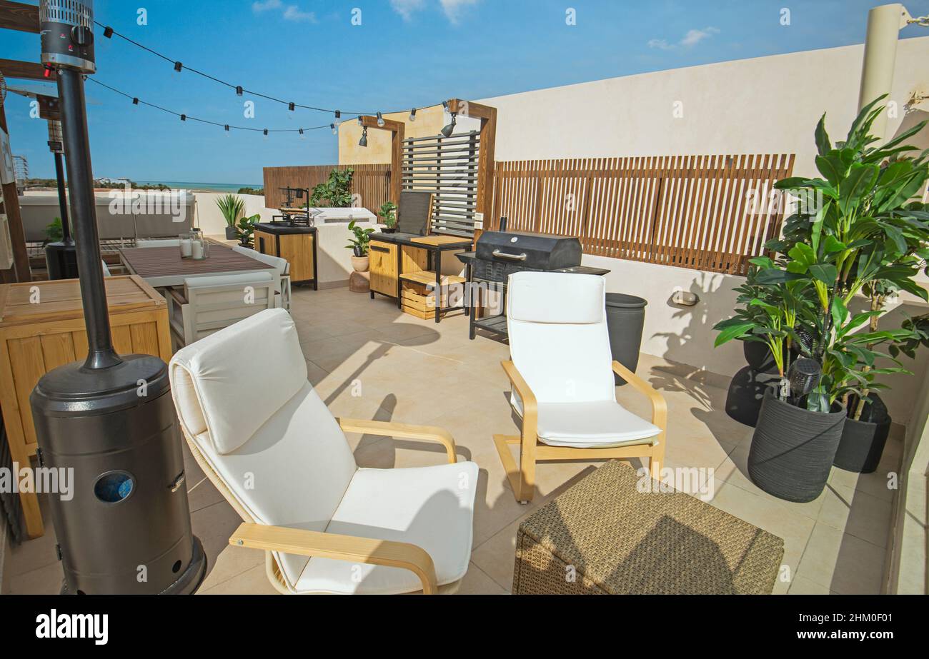 Roof terrace patio furniture at a luxury holiday villa in tropical