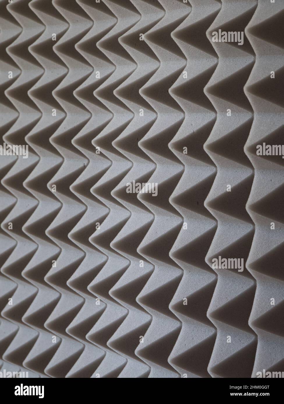 Grey acoustic foam rubber. Soundproof pyramids, full frame Stock Photo Alamy