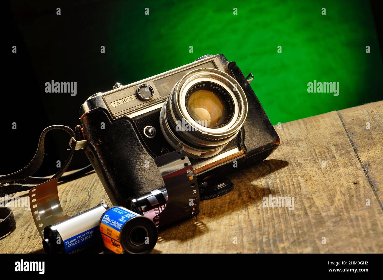 Old Yashica film camera with green background Stock Photo Alamy