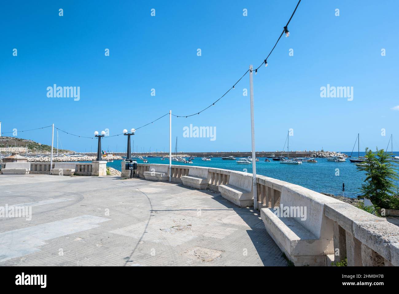 Santa Maria di Leuca, Santa Maria di Leuca, Puglia, Italy. August2021. View of the harbor from the promenade along the sea, beautiful summer day. Stock Photo