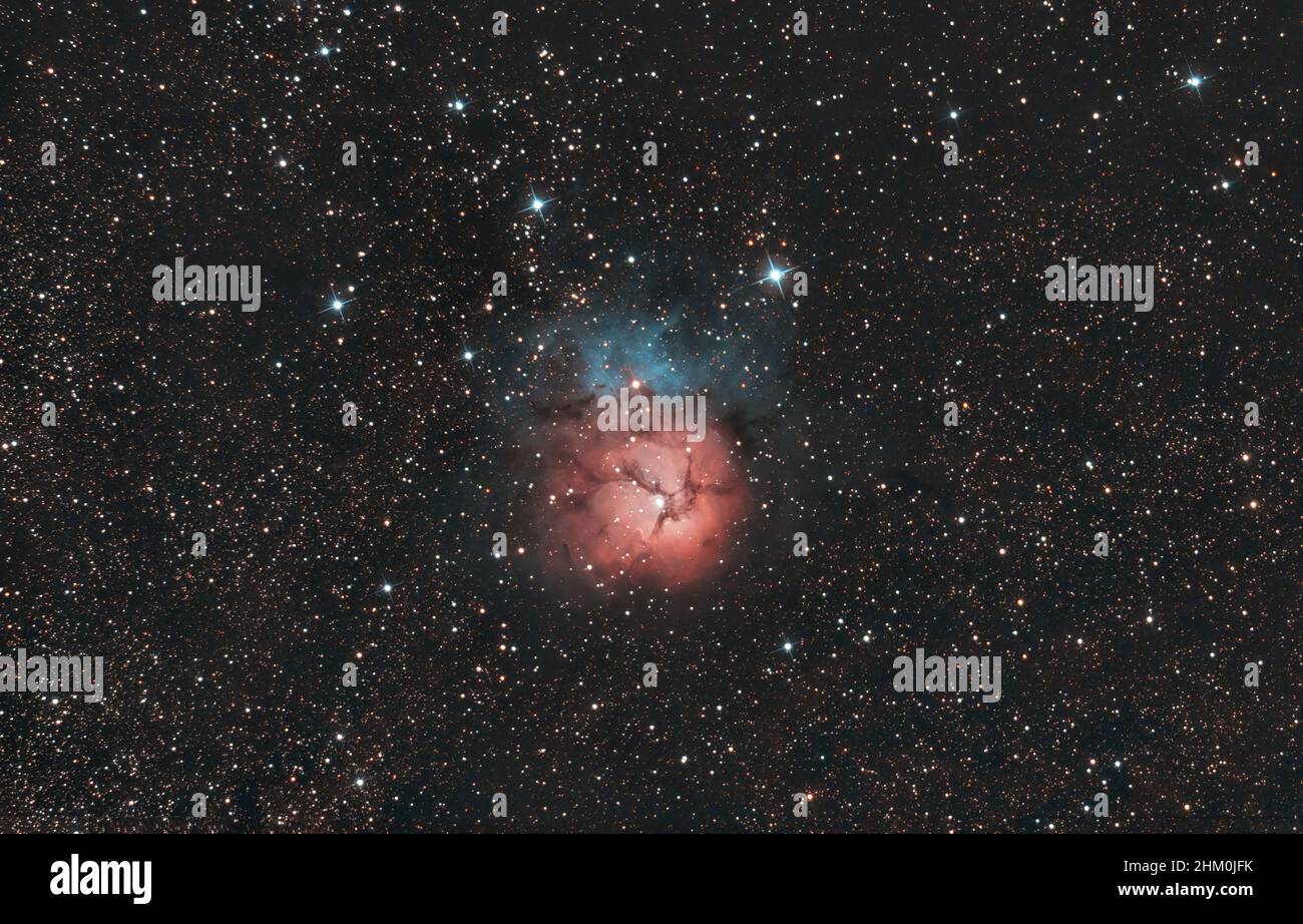 Nebulas in space: M20, Trifid Nebula Stock Photo