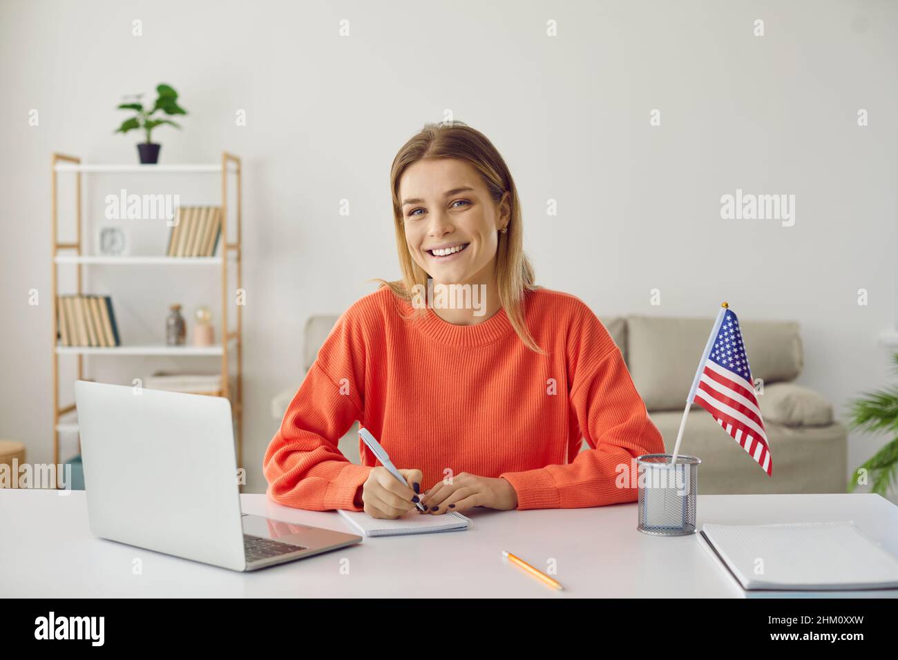 Student girl learning remotely and studying online course at American university Stock Photo