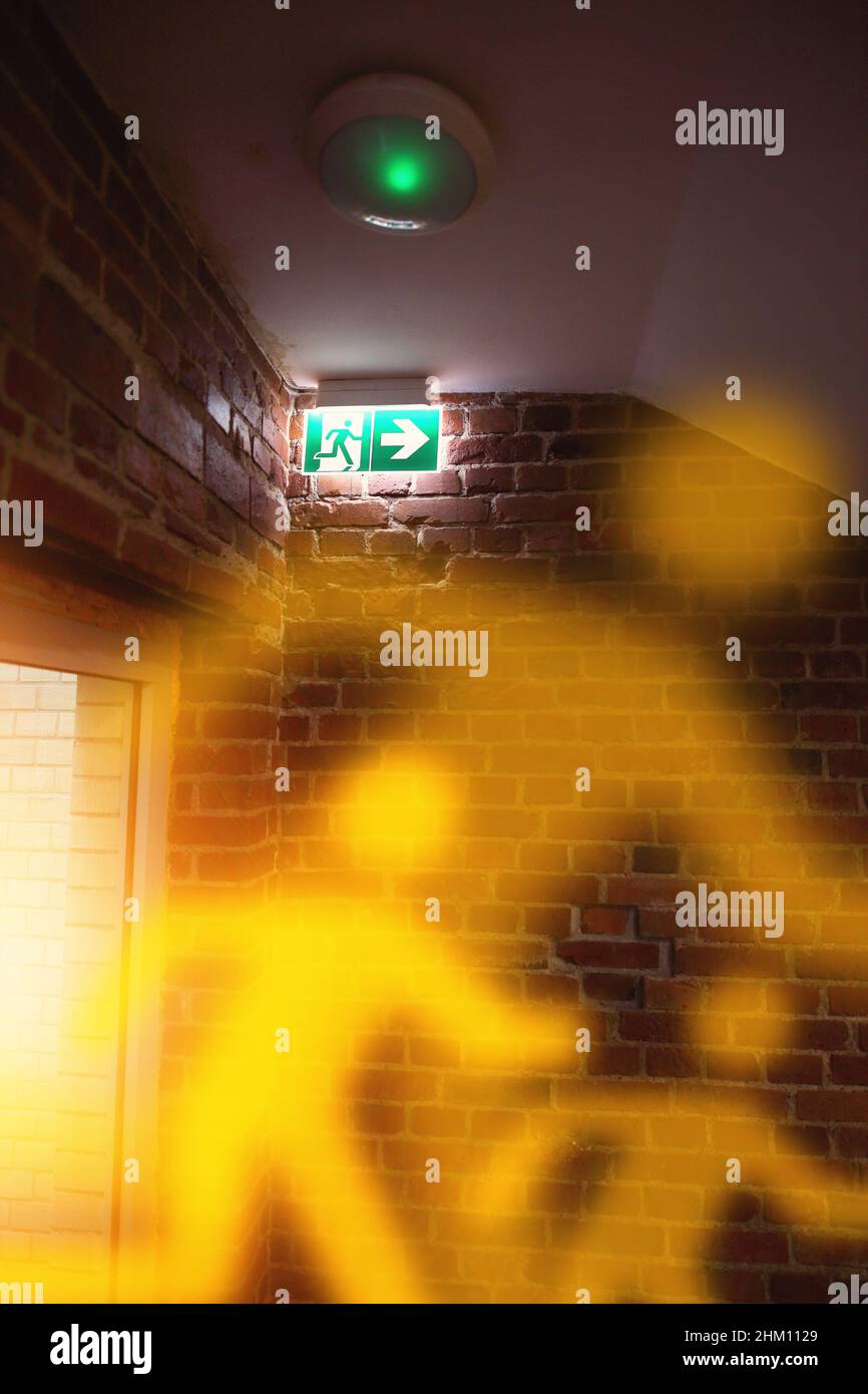 panic in a building during a fire Stock Photo