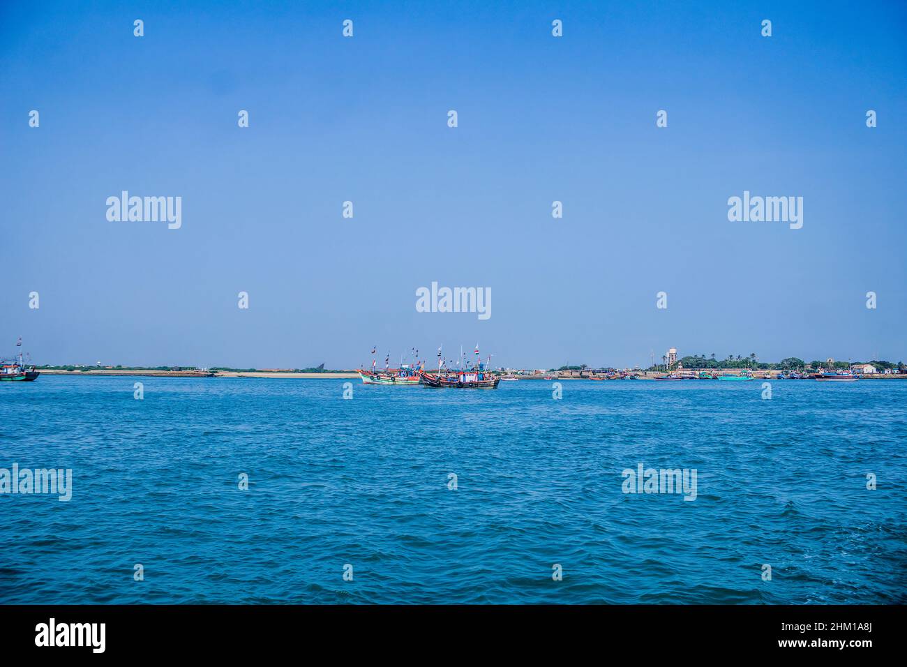 Boats sailing in Bet dwarka Stock Photo Alamy