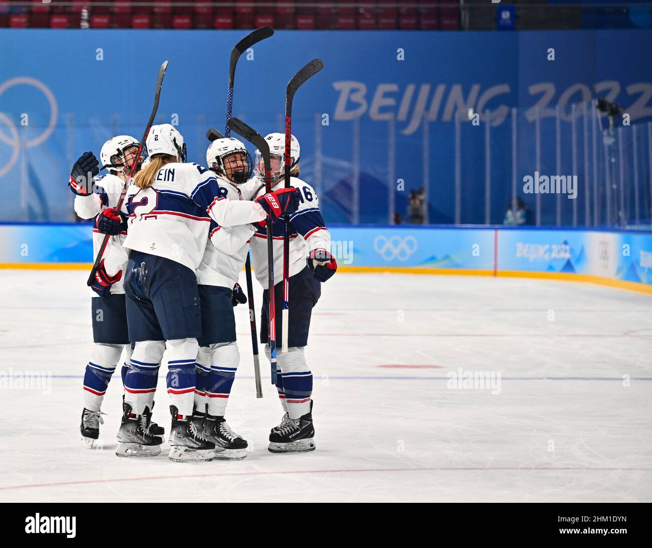 Beijing, China. 6th Feb, 2022. Jesse Compher (2nd R) of the United States celebrates scoring with temmates during the ice hockey women's preliminary round Group A match between Switzerland and the United States at Wukesong Sports Centre in Beijing, capital of China, Feb. 6, 2022. Credit: Song Yanhua/Xinhua/Alamy Live News Stock Photo