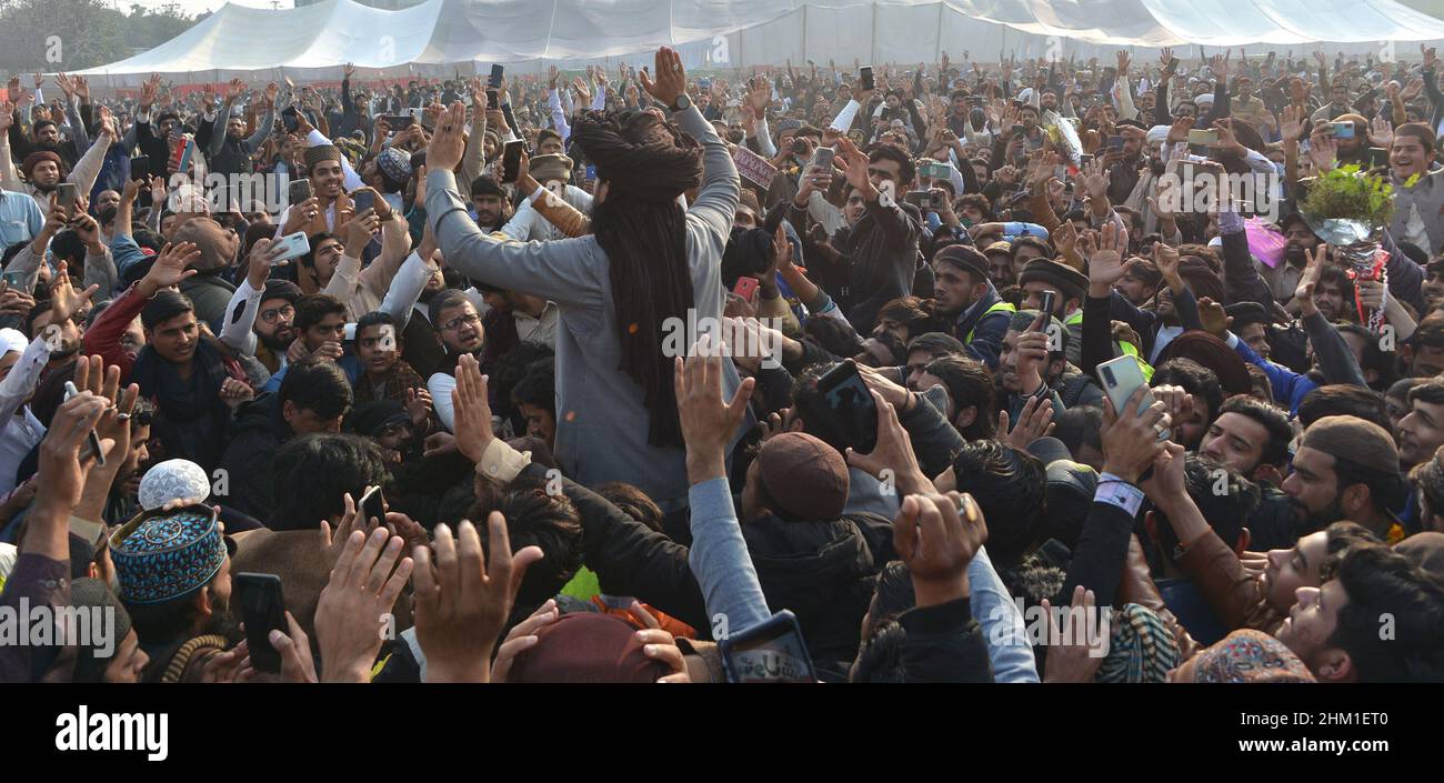 Lahore, Punjab, Pakistan. 6th Feb, 2022. Chief of Tehreek-e-Labbaik Pakistan (TLP) Hafiz Saad Hussain Rizvi waving to his supporters during his wedding ceremony (Waleema) at Sabzazar Cricket Stadium in Lahore. (Credit Image: © Rana Sajid Hussain/Pacific Press via ZUMA Press Wire) Stock Photo