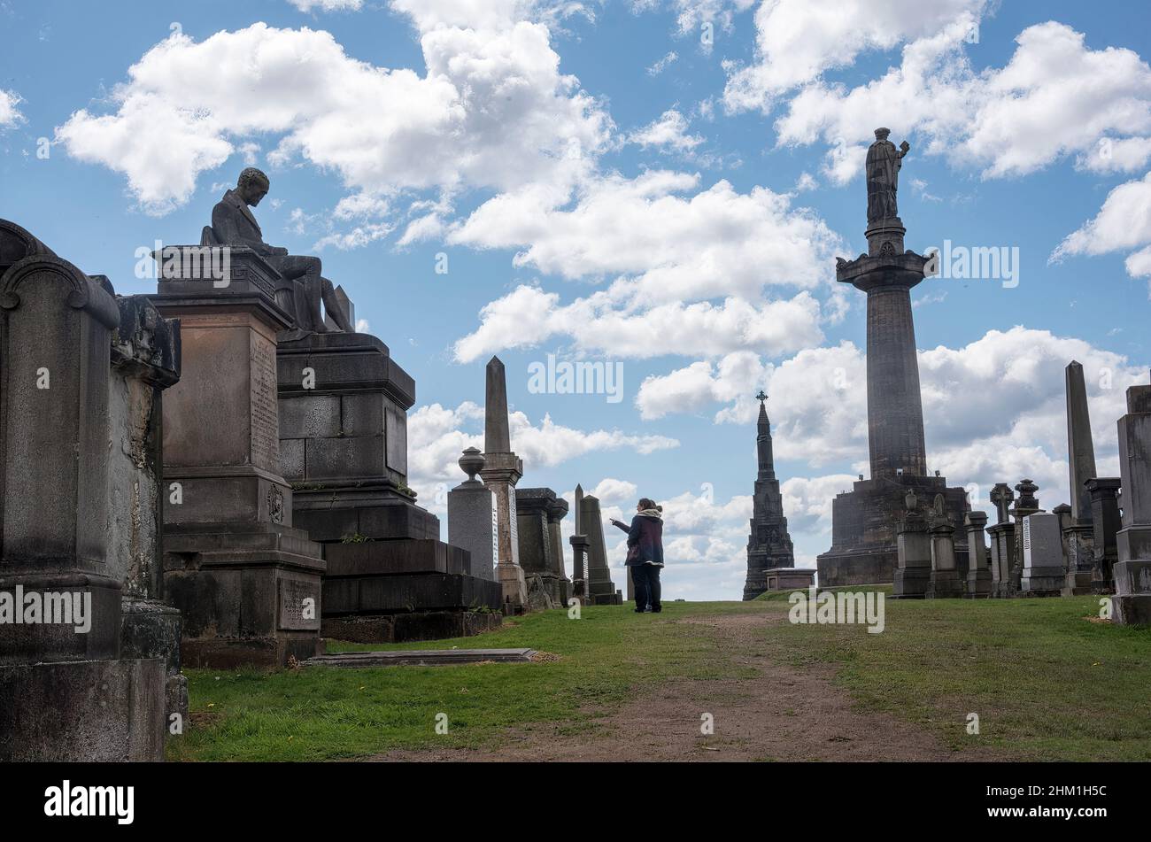 Gravestones and statues at the Glasgow Necropoilis Stock Photo