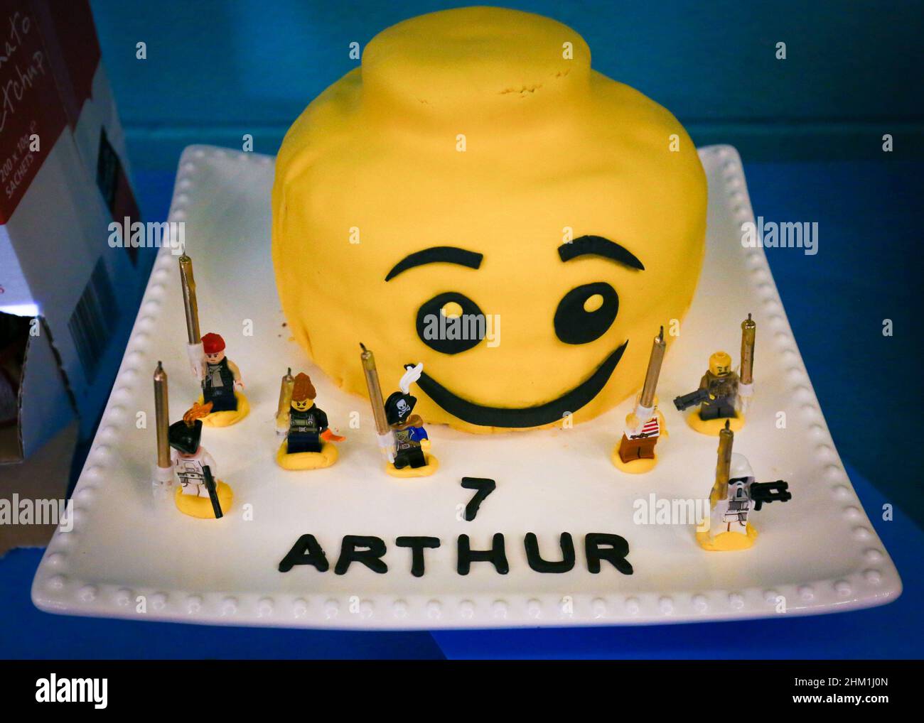 SALISBURY, UK. A lego birthday cake with lego men candleholders