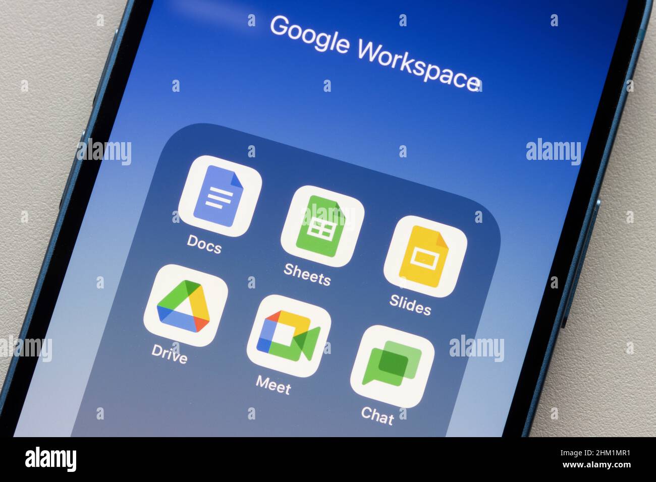 Google Workspace Essentials Starter app icons are seen on an iPhone on February 4, 2022. Google is introducing a free Workspace tier for businesses... Stock Photo