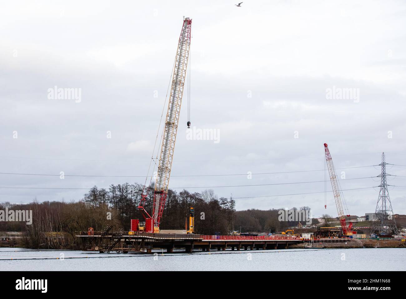 Harefield, UK. 5th February, 2022. A view of works for the HS2 Colne Valley Viaduct, which will become the UK's longest railway bridge, at HOAC Lake (Harefield Lake No. 2). A viaduct requiring 292 piles driven into the aquifer, a natural water filtration system, is currently being constructed to carry HS2 across lakes and watercourses in the Colne Valley Regional Park. Credit: Mark Kerrison/Alamy Live News Stock Photo