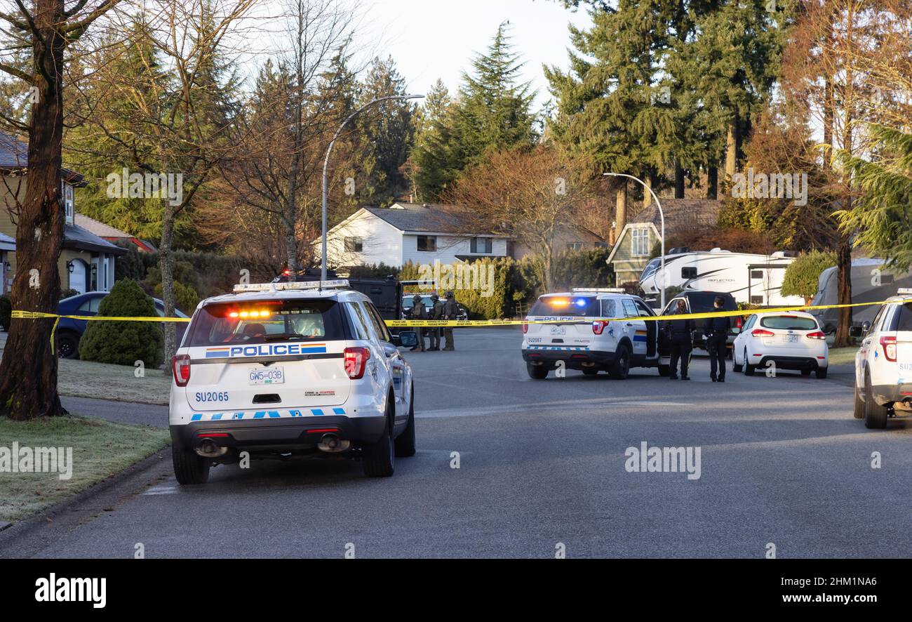 Police and Swat Team are arresting a man for alleged Robery Stock Photo ...