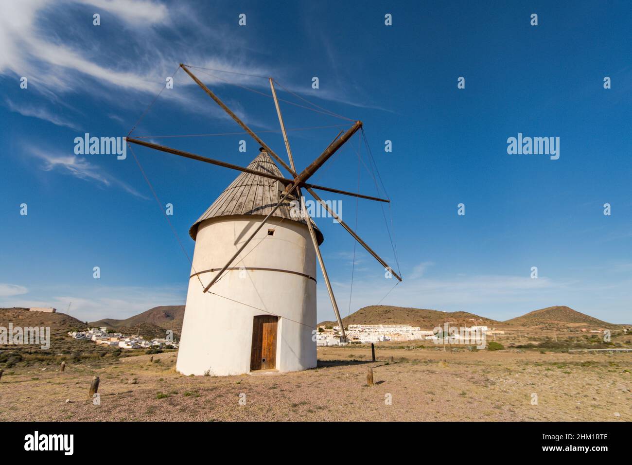 Cabo de Gata Spain. Old restored Spanish windmill in El Pozo de los Frailes, Almeria, Andalucia, Spain. Stock Photo