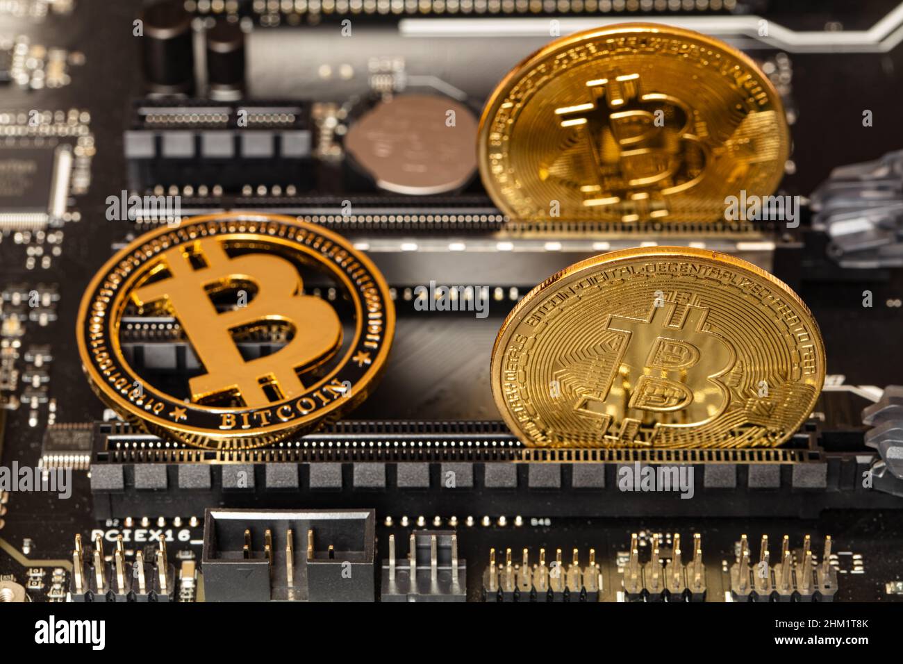 Bitcoin on computer motherboard background. Cryptocurrecy concept Stock ...