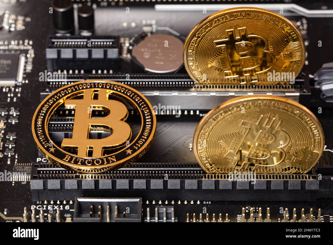 Bitcoin on computer motherboard background. Cryptocurrecy concept Stock ...