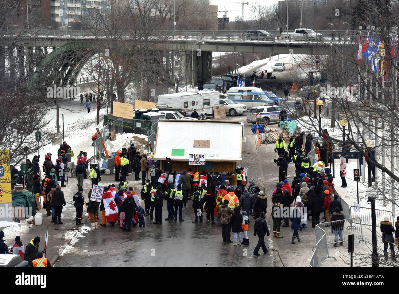Ottawa, Canada – February 6, 2022: Protesters move a building they put up to provide support to their convoy members after they agreed with the police to move it to the new designated site outside the downtown area.  The protest has shutdown much of downtown Ottawa and caused a lot of grief for local residents and business. Stock Photo