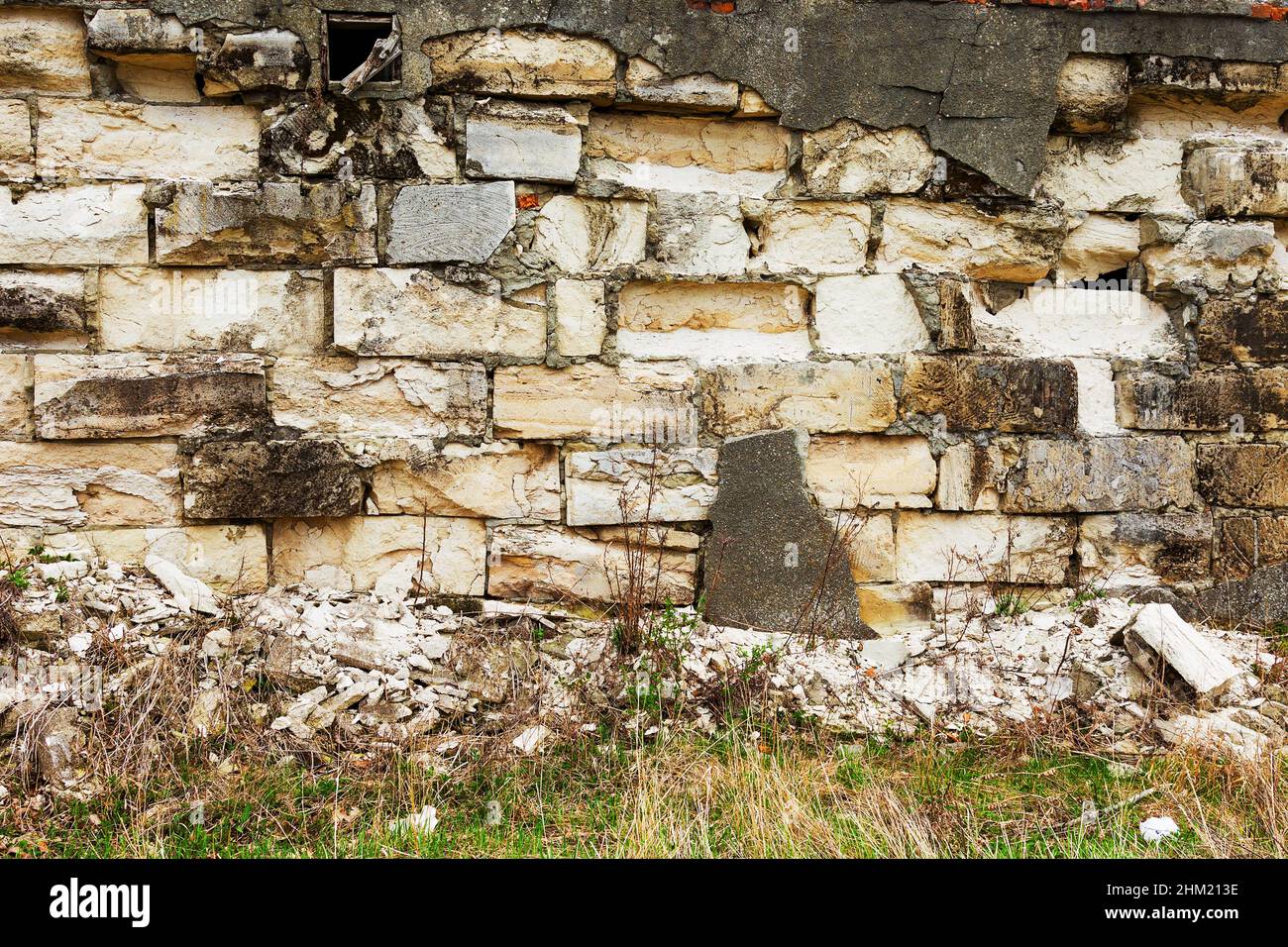 Abstract background old white brick wall with cracks and scratches ...