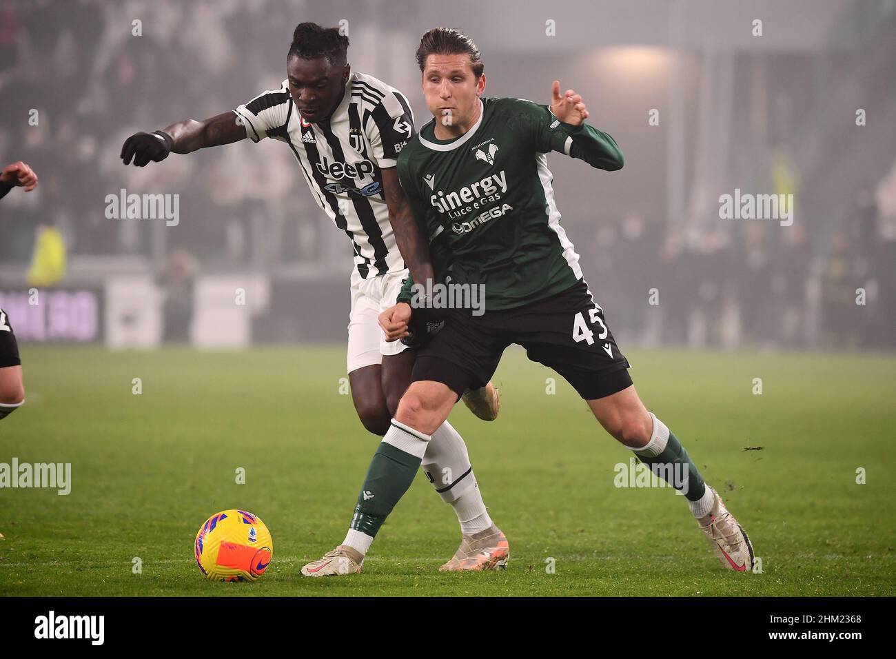 Torino, Italy. 06th Feb, 2022. Moise Kean of Juventus FC and Panagiotis Retsos of Hellas Verona compete for the ball during the Serie A 2021/2022 football match between Juventus FC and Hellas Verona at Juventus stadium in Torino (Italy), February 6th, 2022. Photo Federico Tardito/Insidefoto Credit: insidefoto srl/Alamy Live News Stock Photo