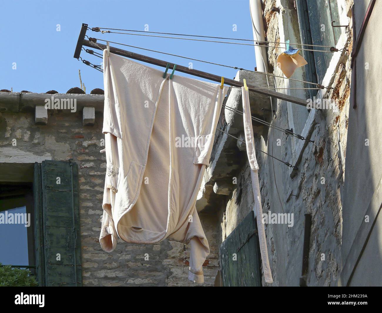 Laundry drying at a window in Venice in Italy Stock Photo Alamy