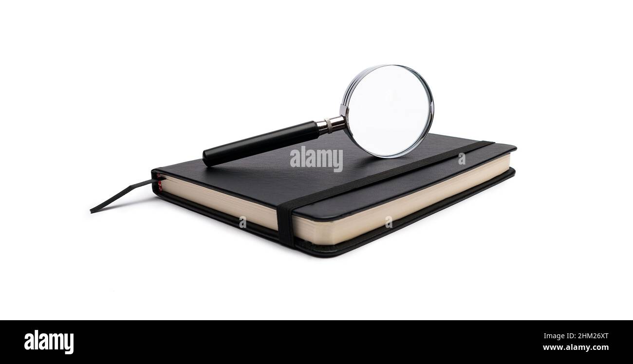 notebook with magnifying glass on white background Stock Photo - Alamy