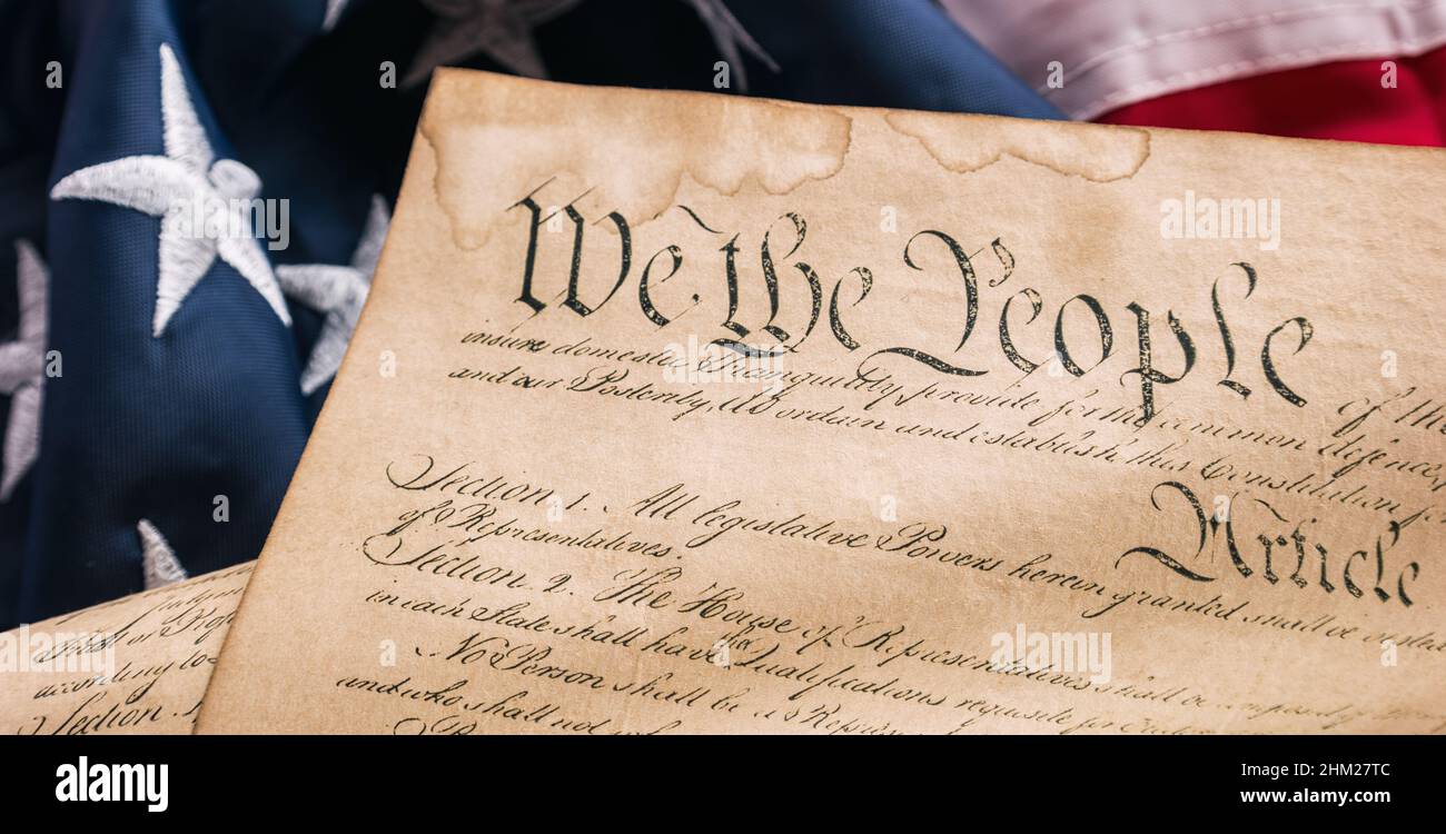 US Constitution with Bill of Rights and Declaration of Independence on an  American Flag Stock Photo - Alamy