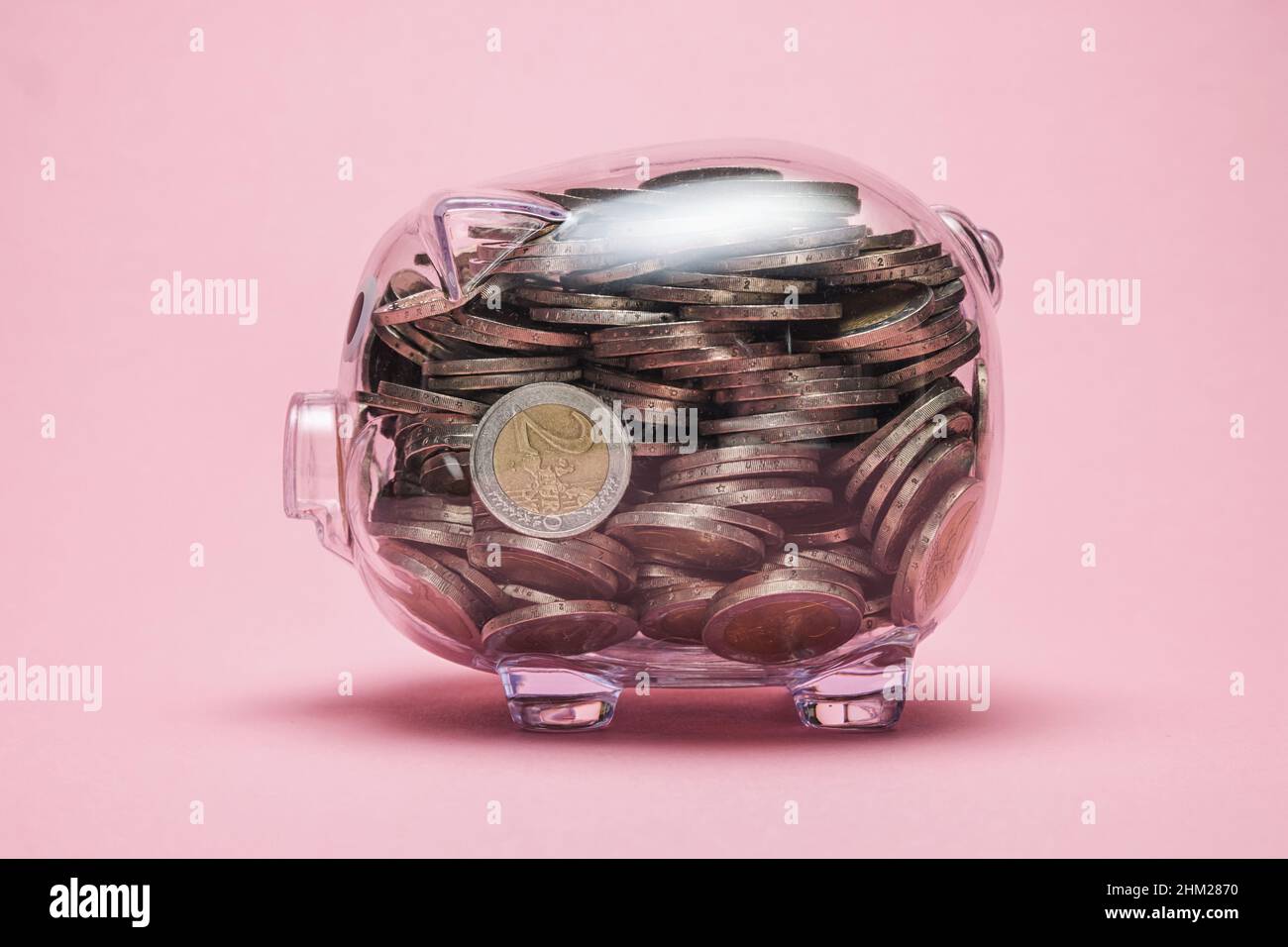 look inside a piggy bank with money coins Stock Photo - Alamy