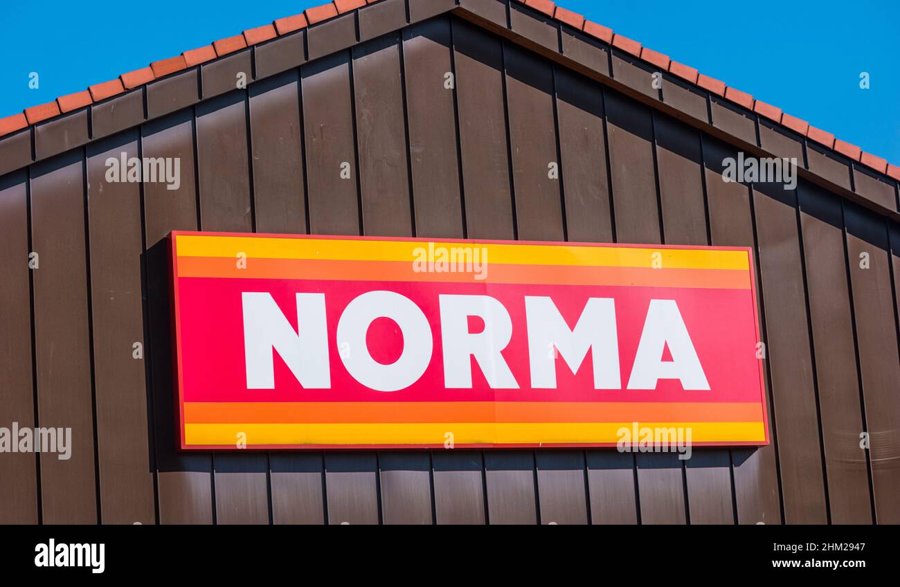 Norma discount supermarket Sign on a Store. Norma is a food discount store with plus 1,400 stores in Europe. Retail concept is a narrow product line a Stock Photo
