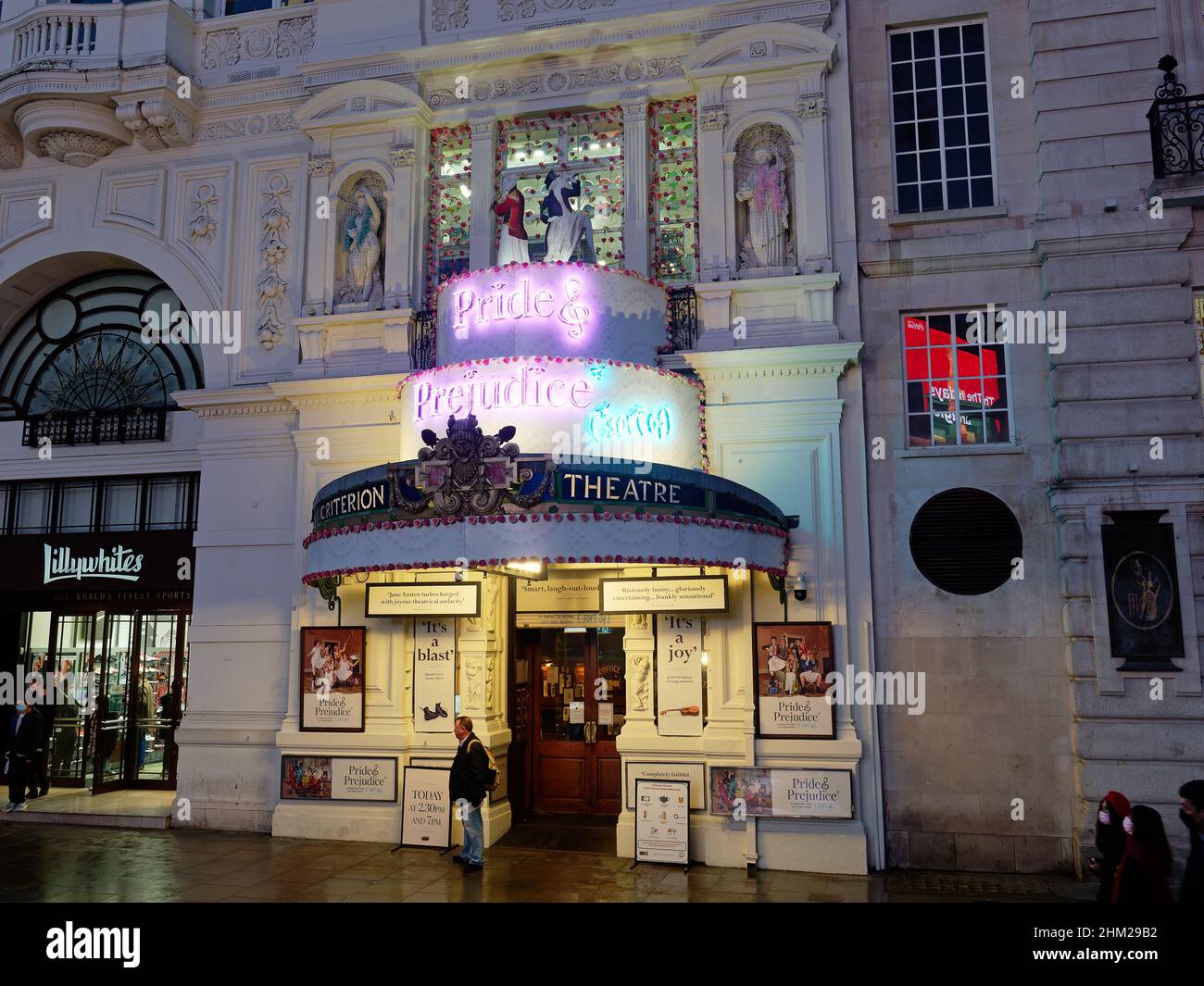 Front view at night of the entrance to the Criterion Theatre in Piccadilly Circus London showing 'About Pride & Prejudice (sort of)' Stock Photo