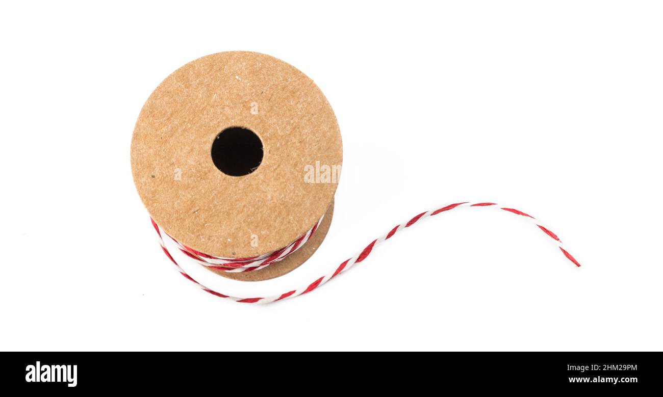 Red and white string twine rope role for christmas gifts Stock Photo