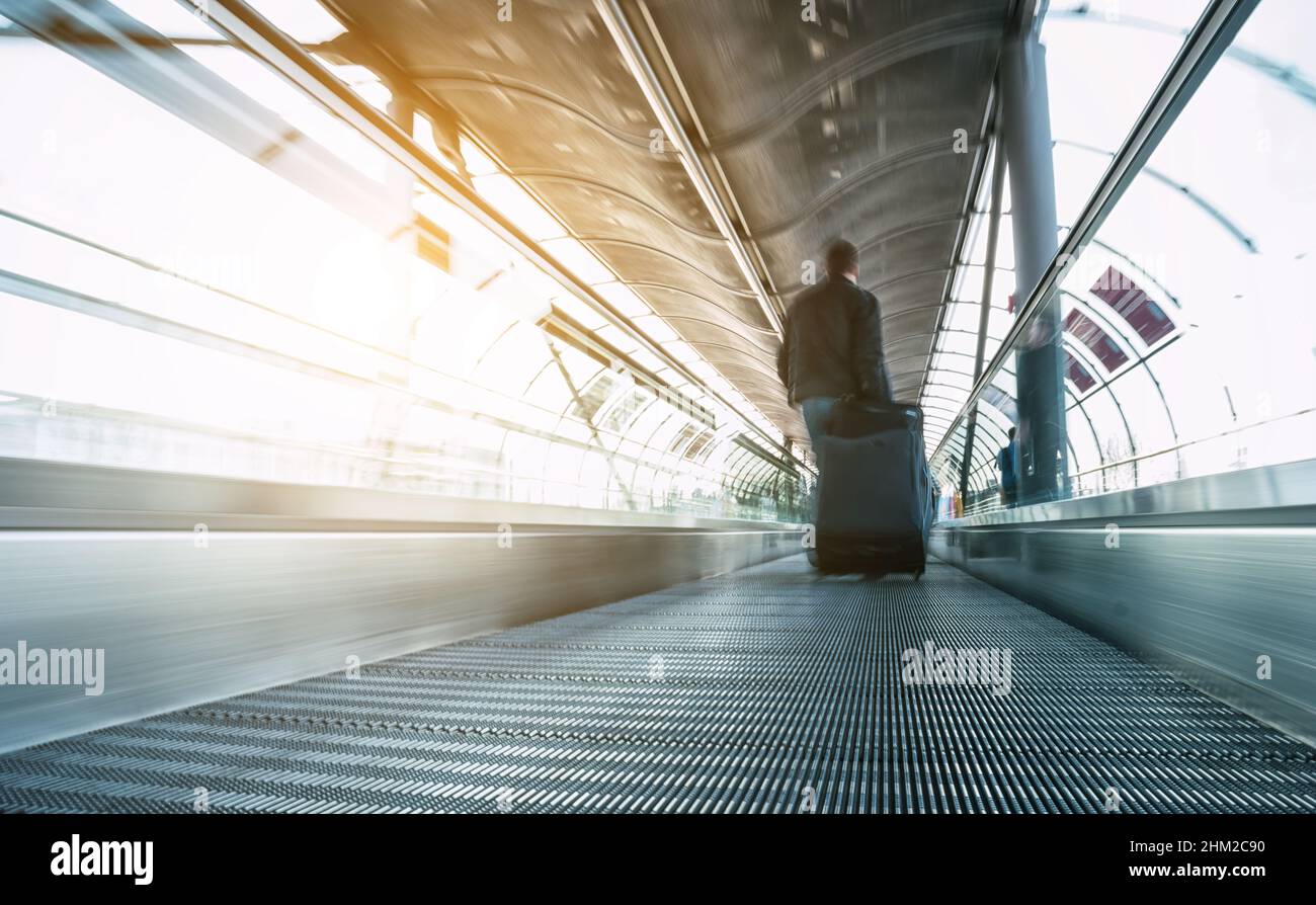 abstrakt image of people in speed on a skywalk Stock Photo