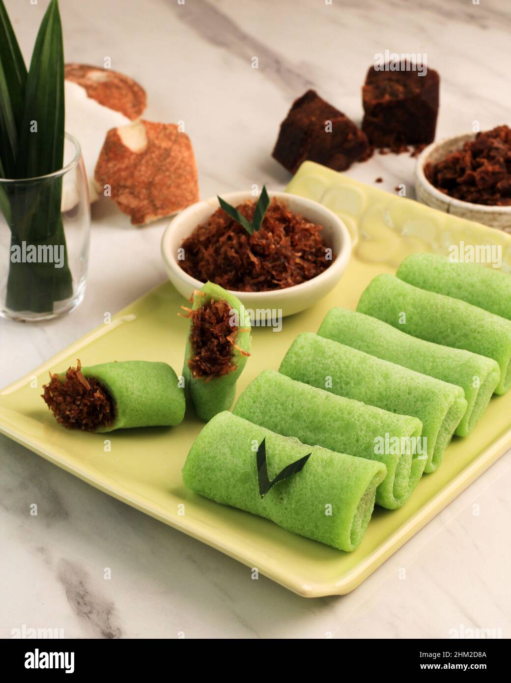 Dadar Gulung, Traditional Indonesian/Malaysian Crepes Snack Made from Glutinous Rice, Grated Coconut, and Palm Sugar. Popular in Malaysia, Indonesia, Stock Photo