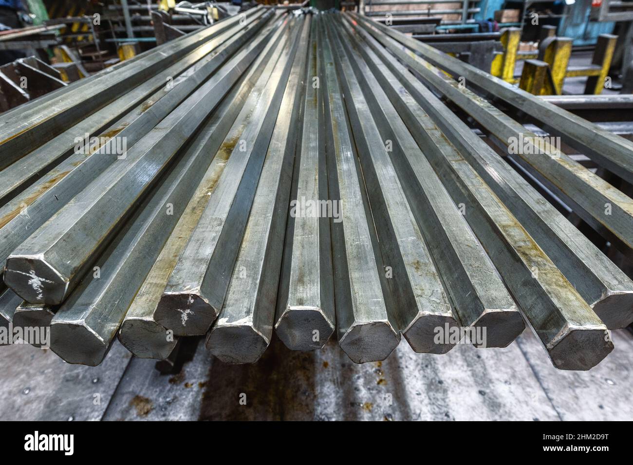 Bundle of hexagonal metal rods, hot rolled steel Stock Photo Alamy