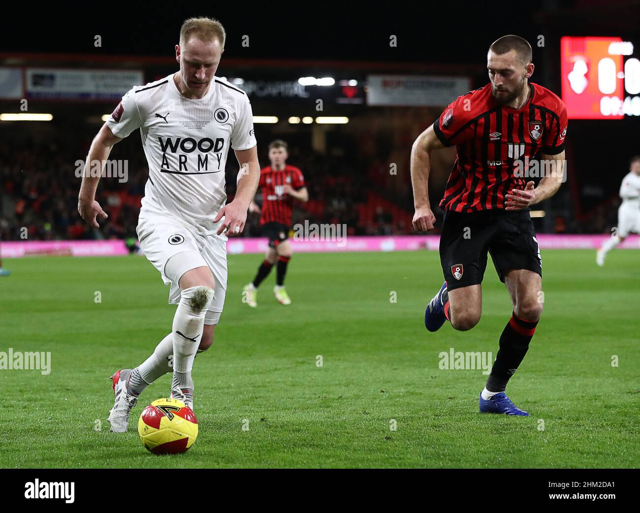 Bournemouth, England, 6th February 2022.  Scott Boden of Boreham Wood with the ball ahead of Nathaniel Phillips of Bournemouth during the Emirates FA Cup match at the Vitality Stadium, Bournemouth. Picture credit should read: Paul Terry / Sportimage Credit: Sportimage/Alamy Live News Stock Photo